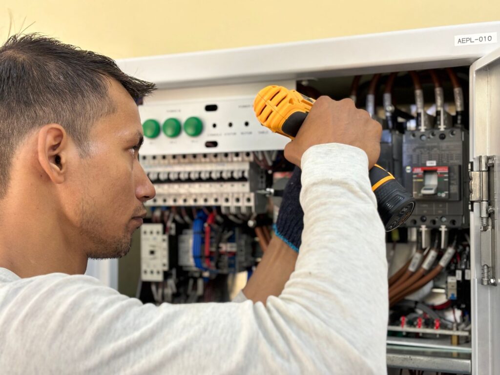 electrician inspecting a residential breaker panel in Belleview FL after a power outage